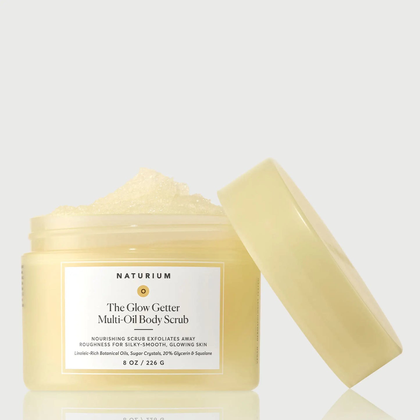 the-glow-getter-multi-oil-body-scrub-l4 NATR-40028-GlowGetter-Multi-Oil-Body-Scrub-Front-CapOff-bonebkgd.webp